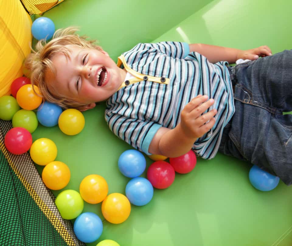 Fun-filled kids’ birthday party location in Boston with bounce houses and arcade games.